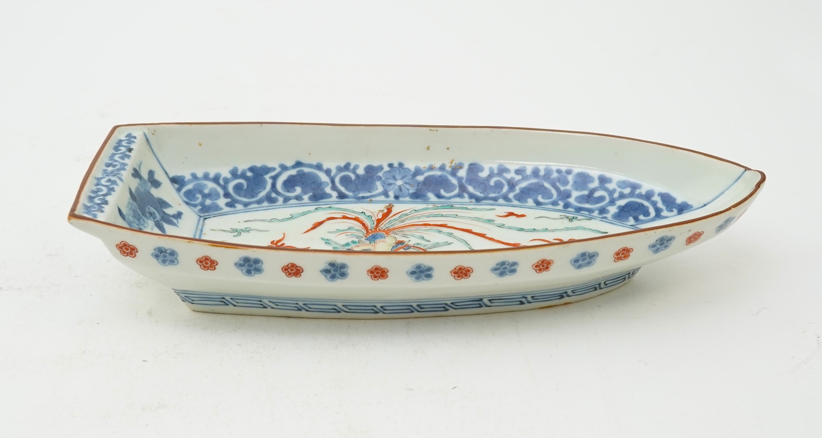 A Japanese Kakiemon style boat shaped dish, 19th century